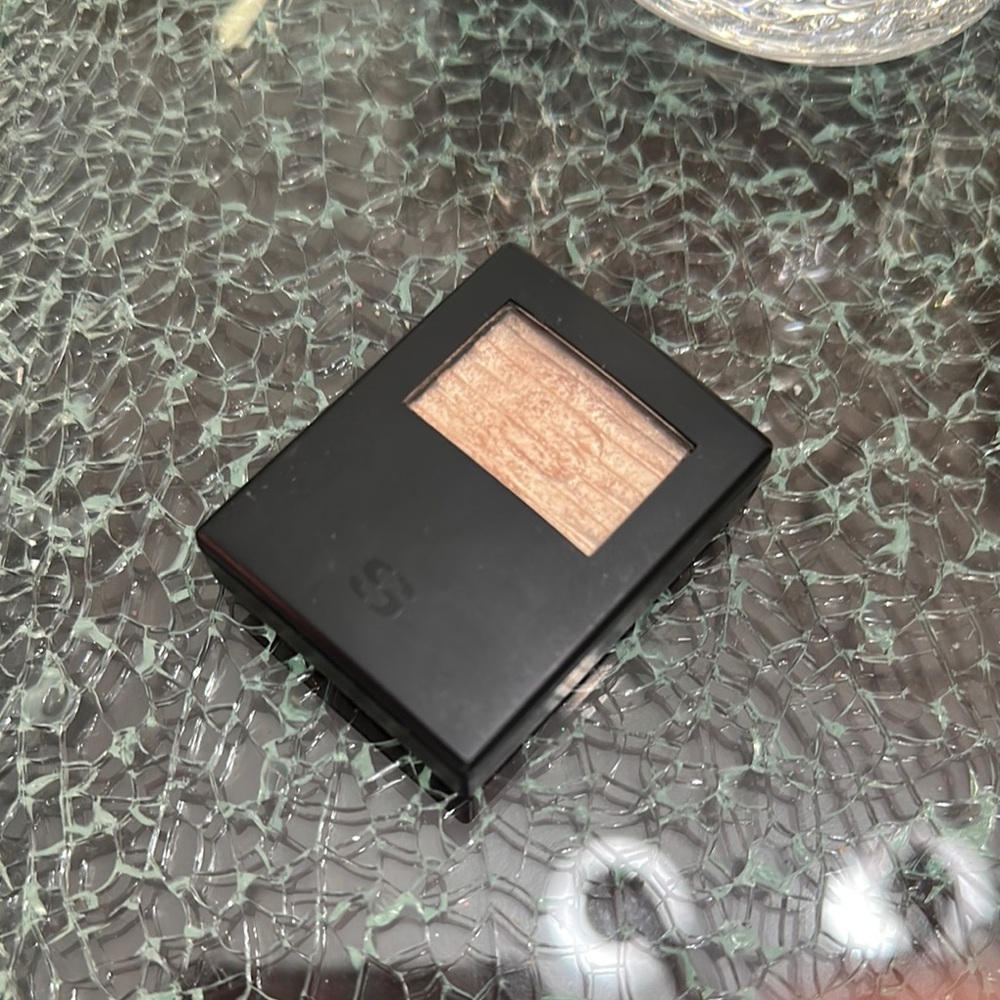 Sisley-Paris Black Compact with Shimmering Gold Eyeshadow